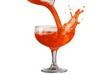 Red liquid pouring into glass creating vibrant splash, refreshing drink movement, transparent background