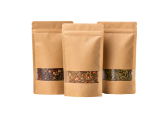 Three standing kraft paper bags with visible windows showing mixed peppercorns, spice blend, and dried herbs inside, isolated on a transparent background