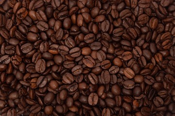 Roasted coffee beans close-up background texture
