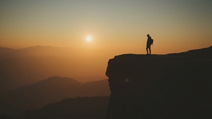 Man overlooking stunning mountain vista at sunset, inspiring adventure and freedom, perfect for travel and outdoor brands seeking authentic connection