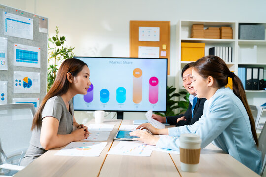 creative Business designer applaud for job success at meeting at office.Planning and brainstorm strategy is the first step.shot of a group of young Asian business people planning on a glass board.
