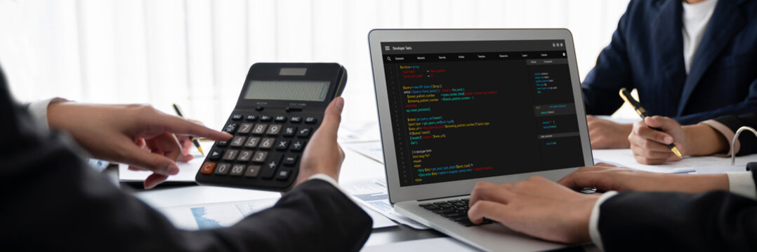 Business intelligence and data analysis concept. Analyst team working on financial data analysis dashboard on laptop screen as marketing indication for effective business strategic planning. Insight