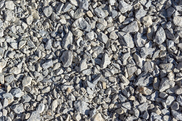 Overhead view of compacted crushed stone base for road or concrete slab foundation