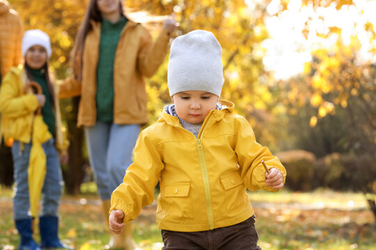 Cute little baby in autumn park