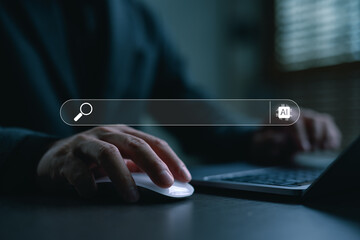 Close-up of hand using computer mouse with virtual AI search engine bar. Concept for artificial intelligence, smart search, machine learning, SEO, data query, and digital transformation.