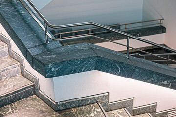 Modern, bright interior with marble and metal trim