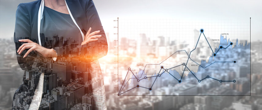 A confident businesswoman stands against a city skyline, analyzing financial graphs and trends. This image represents success, investment, and data-driven decisions in a corporate environment. Scalp
