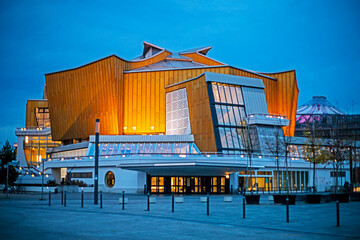beautifully illuminated Berlin Philharmonic Hall in the evening. A journey through Europe.