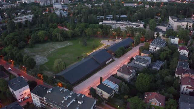 Aerial evening view of Basen Eisenberga, Krak&oacute;w&rsquo;s public sports hub and community gathering place.
