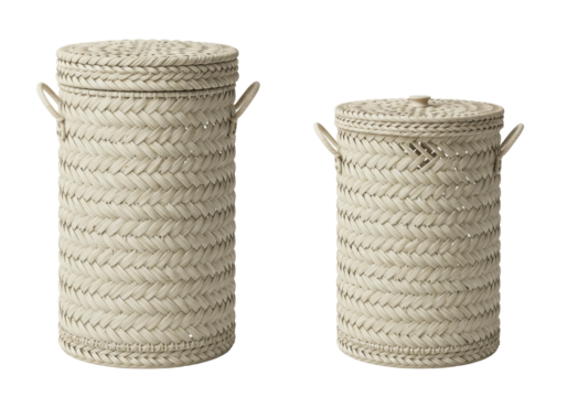 Isolated pair of cylindrical woven baskets with lids and handles are ready for use