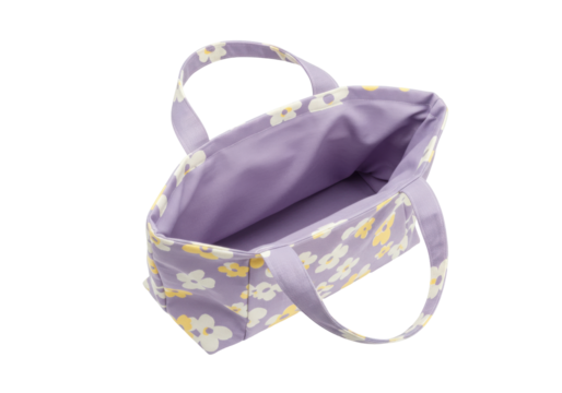 Isolated pastel lavender bag with floral pattern and tote straps for shopping or travel