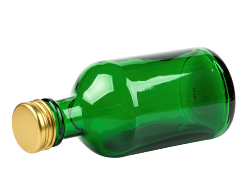 Isolated empty green bottle with golden screw cap ready for product filling, lying down