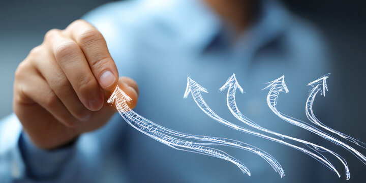 businessman drawing graph