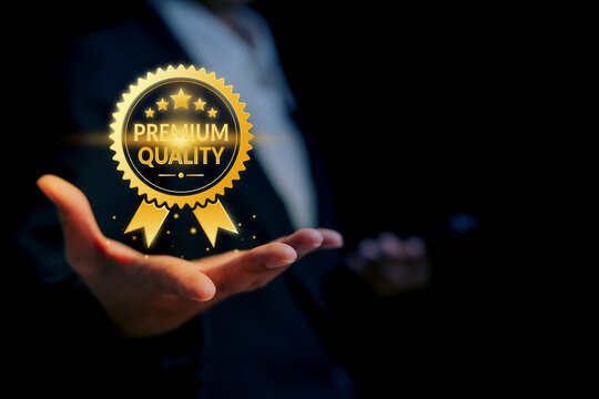 Businessman holding golden premium quality badge, excellence standard, top performance, trust assurance, customer satisfaction, high quality product concept