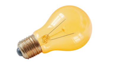 Yellow bulb shines; filaments visible; base silver