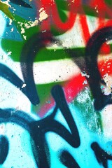 Vibrant graffiti art featuring bold black lines and neon red, green, blue. Urban street style, 90s, Y2K essence, dynamic visual impact. Posters, digital art, modern 90s, Y2K creative banner.