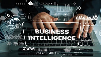 Hands on Keyboard with Data Visualizations and Business Intelligence Graphics in Modern Office...