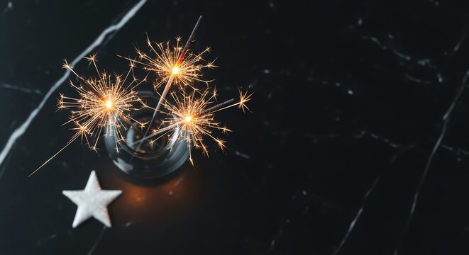 Sparkler candles in glass holder with white star decoration on black background   - Powered by Adobe