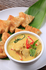 Thai-style Green Curry Chicken Served with Roti. Food photography for use in menus
