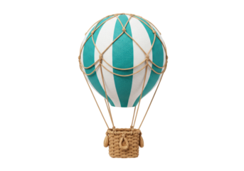 Isolated hot air balloon toy against blank studio shot, wicker basket, decorative object