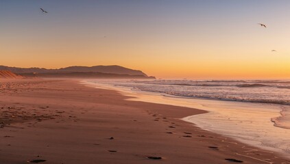 Dawn at the seaside, tranquil coastal morning light, seasonal change