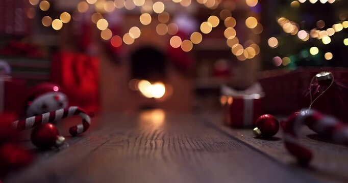 Christmas toys and decorations near the fireplace. Home decor. Smooth camera movement