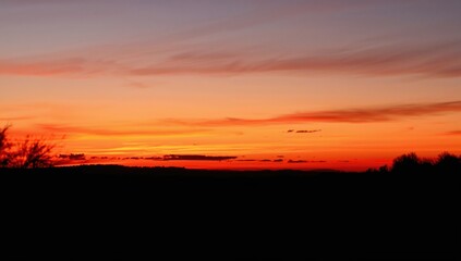 Obraz premium Sunset over the horizon, evoking a sense of tranquility