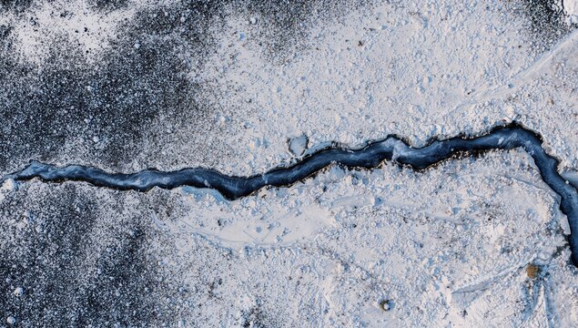 Aerial view of the Lena River's delta in Siberia, winter landscape texture, seasonal change