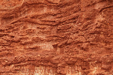 Fototapeta premium Geological details of the soil laye of Fung Daeng-Red Cliffs, Bang Saphan Noi in Prachuap khiri khan Province, Thailand