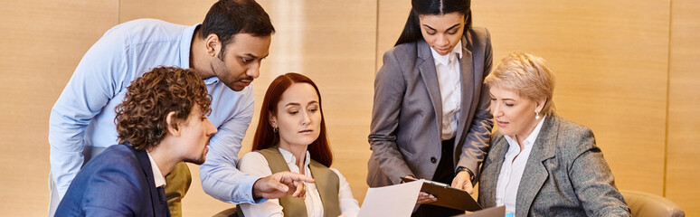 Collaborative teamwork in a modern office setting focused on project planning