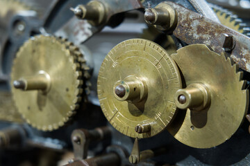Antique clock mechanism with brass gears and cogs