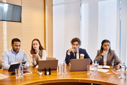 Collaborative business meeting in a modern office setting with engaged professionals - Powered by Adobe