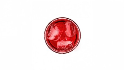 Red beverage with ice cubes in a glass against a white backdrop, refreshing drink option