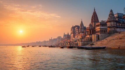 Sunrise over varanasi ghats and ganga river with ancient temples. Sacred indian culture and spiritual travel destination. Boating at dawn.