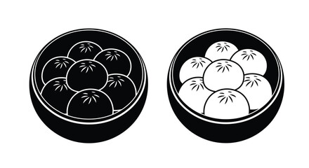 Two black bowls filled with circular dumplings one dark and one light