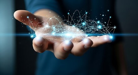 Hand holding exploding digital particles and light streaks