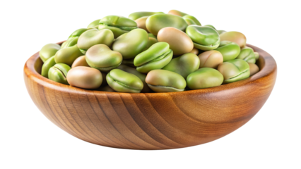 Freshly harvested green fava beans piled high in a rustic wooden bowl isolated on transparent background