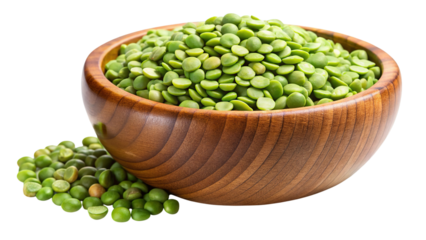 A rustic wooden bowl overflowing with vibrant green split peas and a small pile scattered beside it isolated on transparent background