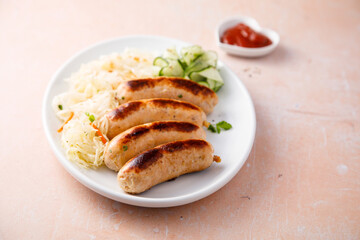 Homemade sausages with sauerkraut