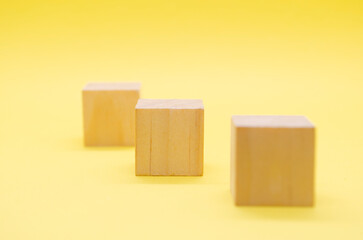 Close up view of isolated wooden cube with customizable space for text or ideas. Copy space concept.