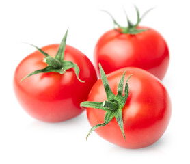 three cherry tomatoes on a white isolated background