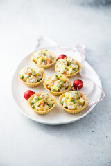 Traditional Russian salad served in tartlets