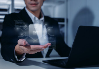 Businessman Presenting Cyber Security and Data Protection Concept with Digital Lock and Circuit Board Interface, Showing Corporate Information Privacy, Network Safety, and Technology of Encryption.