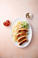 Homemade sausages with sauerkraut