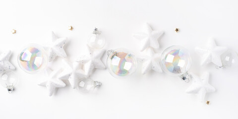 Festive Christmas ornaments on a white background.