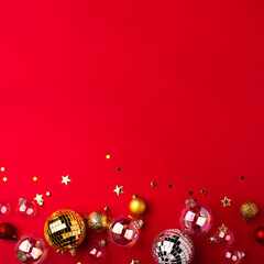 Festive Christmas ornaments on a red background.