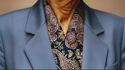 Elegant Blue Suit and Paisley Scarf Fashion Statement.