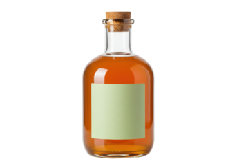 Isolated glass bottle of amber liquid with a light green label and cork stopper, studio shot