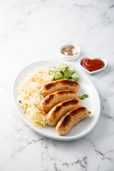 Homemade sausages with sauerkraut