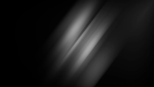abstract modern dark background animation with blurred glowing diagonal lightstreaks. 4K seamless loop